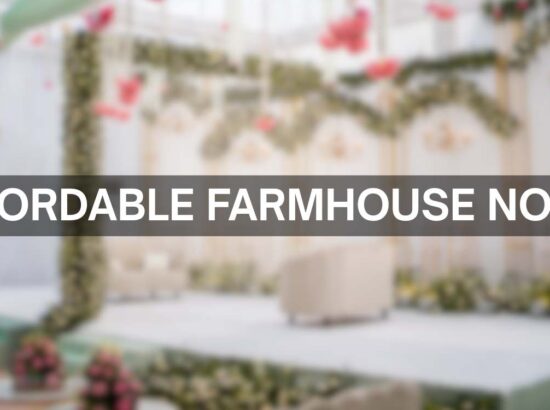 Affordable Farmhouse in Noida by Peacock Bay and Addy Events, featuring elegant wedding stage décor with floral arrangements and seating.